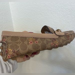 Brand new Coach loafers, pretty flower detail. Says size 10, but fits like a 9.